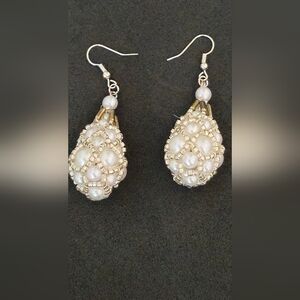Elegant women's earrings made of artificial pearls and beads, handcrafted